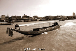 Longtail boat on the Chao Phraya river. by Stuart Ganz 
